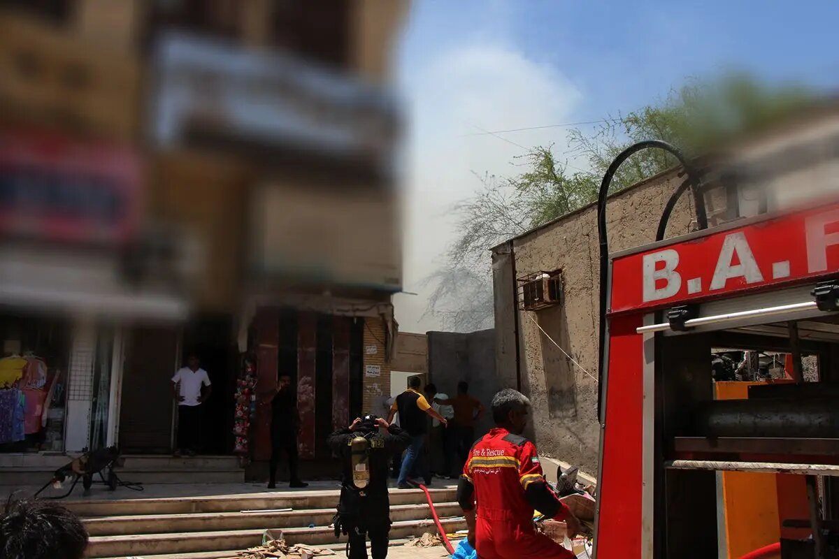 نجات زن گرفتار در آتش‌سوزی منزل مسکونی